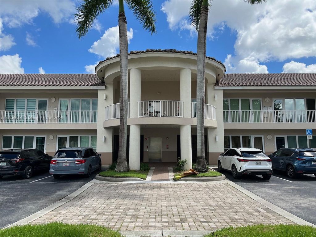 Photo of 5220 S University Dr #106C, Davie, FL 33328 (MLS # A11895619)