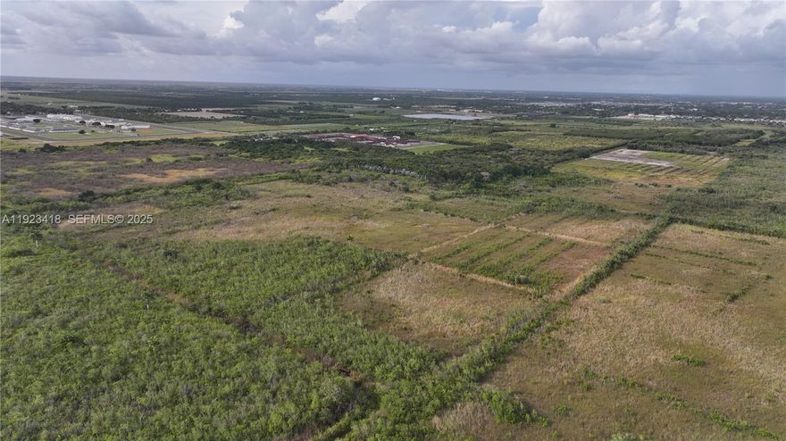 Great opportunity to own 5 acres of vacant land in the growing Homestead area. Ideal for agricultural use, a private homesite, or long-term investment. Enjoy wide-open space, privacy, and easy access to the Turnpike, shopping, and the Florida Keys.