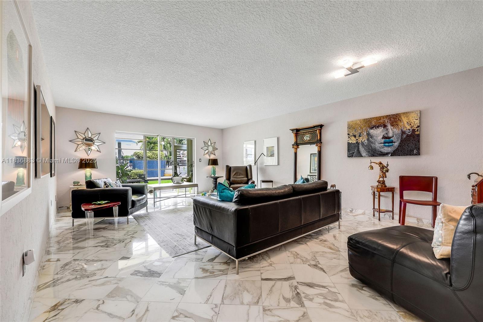Discover this beautifully remodeled 2-bedroom, 2-bathroom unit featuring 1,321 sq ft of luxurious living space. Enjoy a modern kitchen with stainless steel appliances, elegant marble floors, and a private balcony with garden and pool views.
Highlights include a spacious walk-in closet, laundry rooms on each floor, and additional storage. Stay fit in the new gym or relax by the pool overlooking the serene lake. With impact windows and hurricane shutters, your safety is assured. Don’t miss this exceptional living opportunity—schedule your viewing today!
