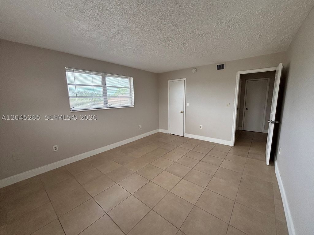 Photo of 6601 SW 18th St #210, Pembroke Pines, FL 33023 (MLS # A12045285)