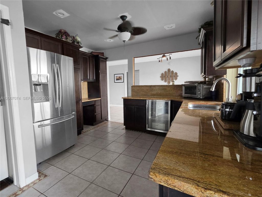 Photo of 11661 NW 31st Pl, Sunrise, FL 33323 (MLS # A12007074)