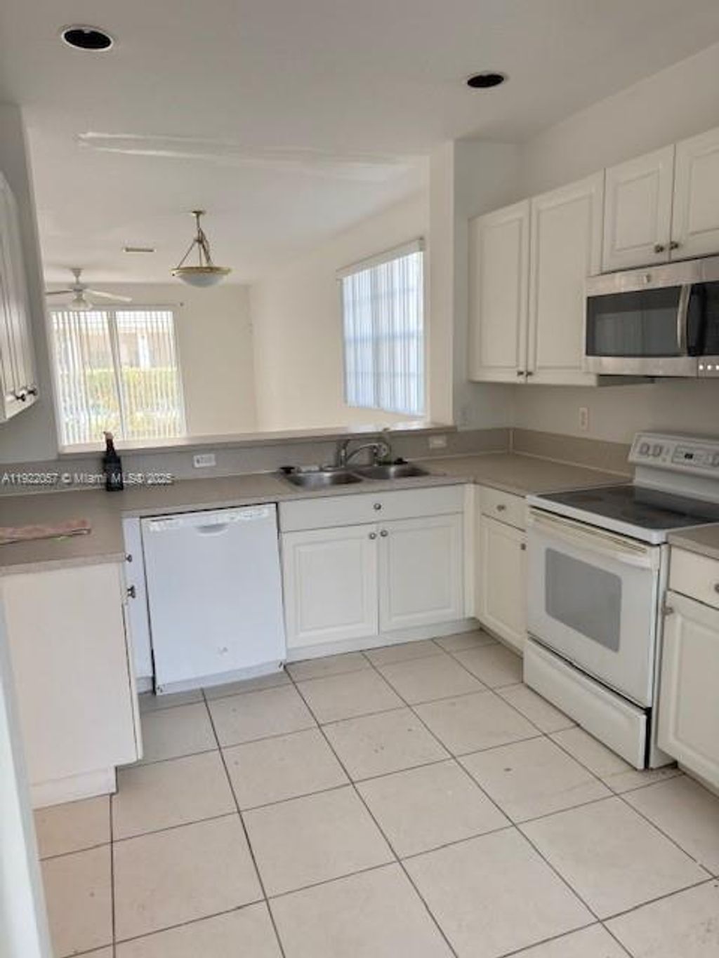 Photo of 677 NW 42nd Ave #677, Plantation, FL 33317 (MLS # A11922057)