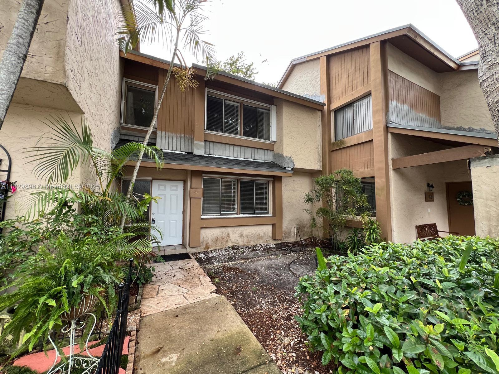 Impeccable two stories townhouse with 3 bedrooms and 2 1/2 bathrooms in the city of Plantation. This unit is 1,500 sq ft. with living room, dining room, breakfast area, master bedroom with master closet, storage closet and laundry room with washer and dryer. First floor is ceramic tile and stairs and second floor are wood floors. The kitchen has wood cabinets, granite countertops and stainless steel appliances. Both SGD are impact glass. It has two assigned parking spaces and a back terrace. Unit is completely painted. The rental of this property requires association approval. It's available to show and for immediate rental. Tenants will need to pay the prorated days of the first month, a security deposit and the last month. CALL LISTING AGENT TO SCHEDULE A SHOWING.