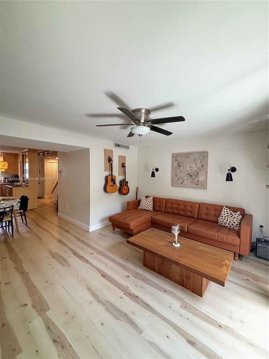 Move-in ready paradise! Spacious, and beautifully updated 2 story ,2 oversized bedrooms/1,5 bath corner unit. 
Bright and spacious layout on the main floor with private fenced patio. In-unit new washer and dryer. 
On the second floor, two generously sized, sunlit bedrooms await, each with ample closet space.
Desirable gated community of Racquet Club offers pool, tennis courts, gym, game room, convenient parking.
Just minutes from the beaches, downtown Fort Lauderdale, shops and restaurants in Wilton Manors.
Water, sewer, garbage removal and pest control included in the maintenance. The Milestone Reports, Structural Integrity Reserve Study(SIRS )and Certification are completed and Incorporated into the 2025 Budget. No special assessments!