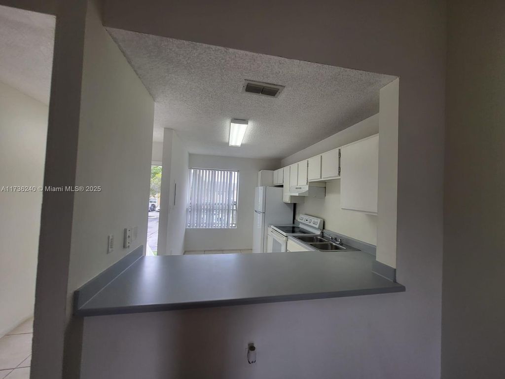 Photo of 2159 SW 80th Ter #2159, Miramar, FL 33025 (MLS # A11736240)