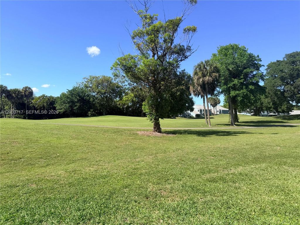 Photo of 8176 Pine Cir, Tamarac, FL 33321 (MLS # A12003717)