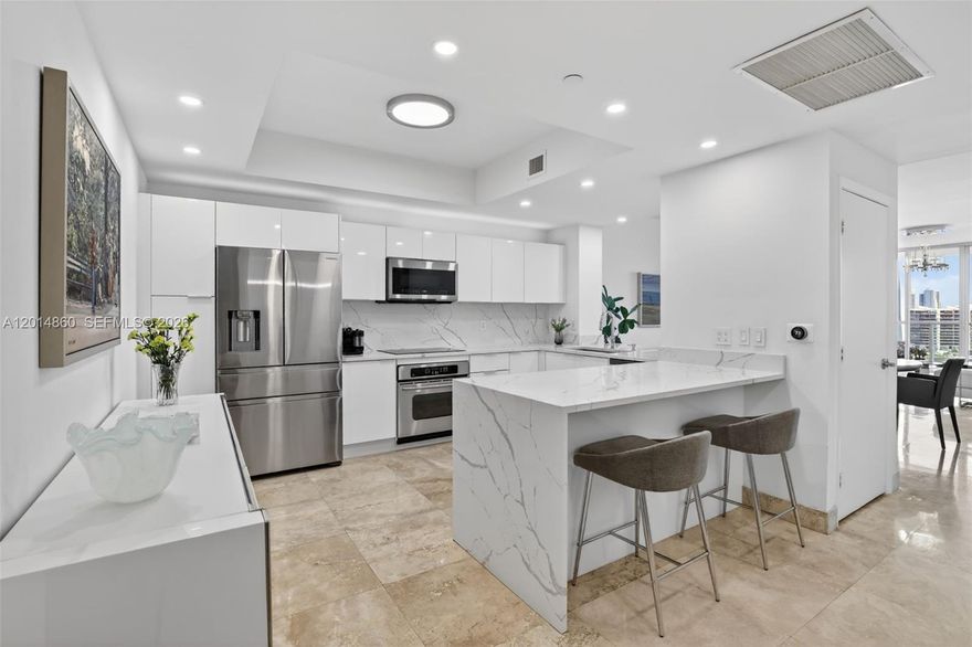 WOW! ENTER THIS AMAZING RENOVATED RESIDENCE AND IMMEDIATELY & THROUGHOUT SEE THE BEST VIEWS. NEW WHITE & BRIGHT - RENOVATED OPEN KITCHEN - NEW BATHROOMS - STUNNING CUSTOM LIGHTING. COVETED SPLIT BEDROOM PLAN, TWO BEDROOMS PLUS DEN/OR 3RD BEDROOM, 2.5 BATHS. ALL REDONE. NEW AIR CONDITIONING. IMPACT GLASS WINDOWS. LARGE TERRACE. LARGE PRIMARY SUITE WITH TERRACE, WATER VIEWS, LARGE WALK IN CLOSET, NEW WHITE BATH WITH DUAL SINKS. UTILITY ROOM W/WASHER & DRYER. A GEM!
AMENITIES INCLUDE 2 CLUBHOUSES W/KITCHEN FACILITIES, BILLIARDS ROOM, 2POOLS, JACUZZI, NEWLY REMODELED MAIN GYM W/NEW EQUIPMENT IN WEIGHT, CARDIO, AND AEROBIC ROOM OFFERING DAILY CLASSES, COLD PLUNGE ROOM, STEAM/SAUNA, NEW DOG PARK, LOCATED NEXT TO FOUNDERS PARK, PICKLEBALL/TENNIS/BASKETBALL COURTS, AVENTURA MALL! WONT LAST! NO ASSESSMENTS!
