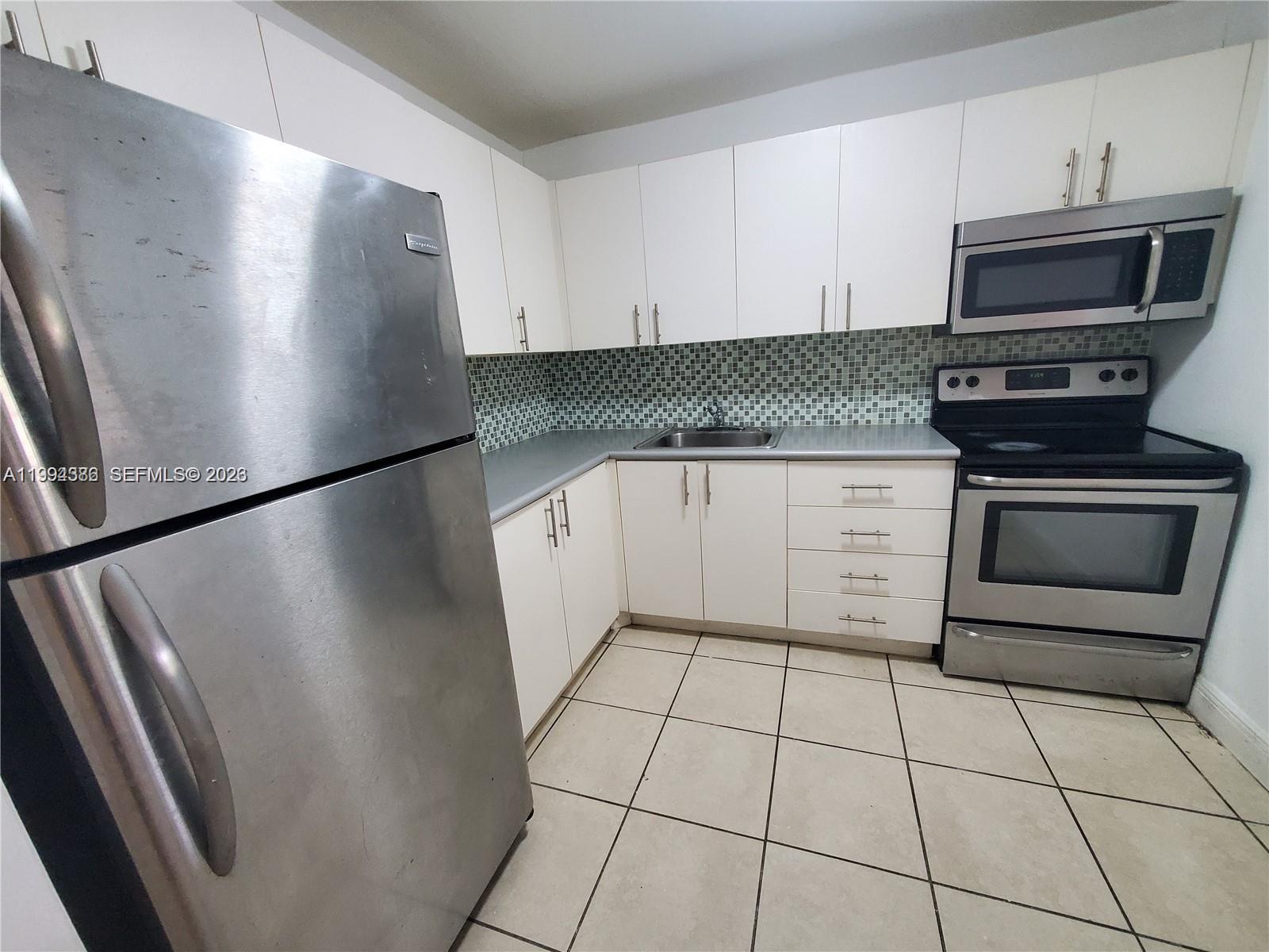 WOODSIDE APTS CONDO - Residential