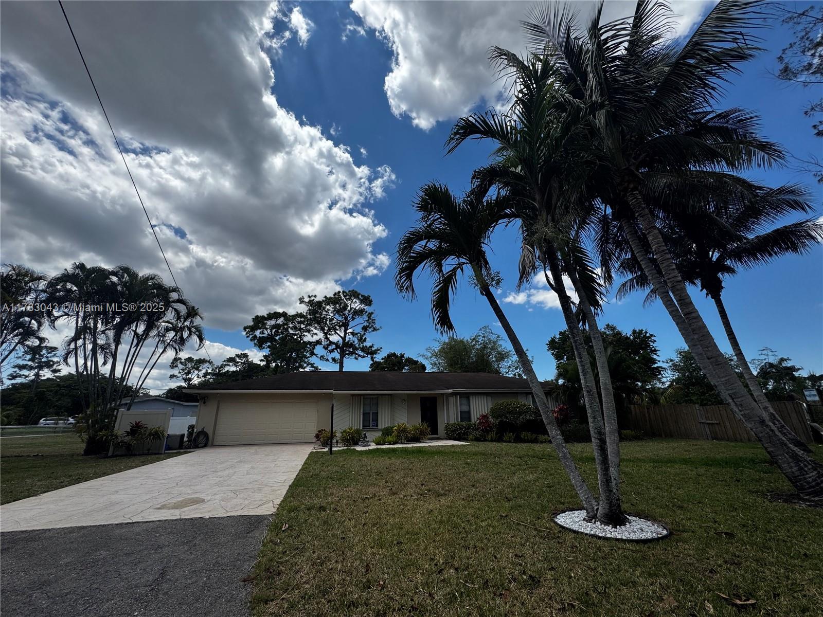 Discover this pristine single-story home featuring 3 bedrooms, 2.5 bathrooms, a covered 2-car vehicles. The primary suite offers a private bath and generous closets; two secondary bedrooms share a full bath. Enjoy a bright living room, family room, kitchen with breakfast bar, laundry room with a half bath, and a spacious yard with a covered terrace—perfect for gatherings.