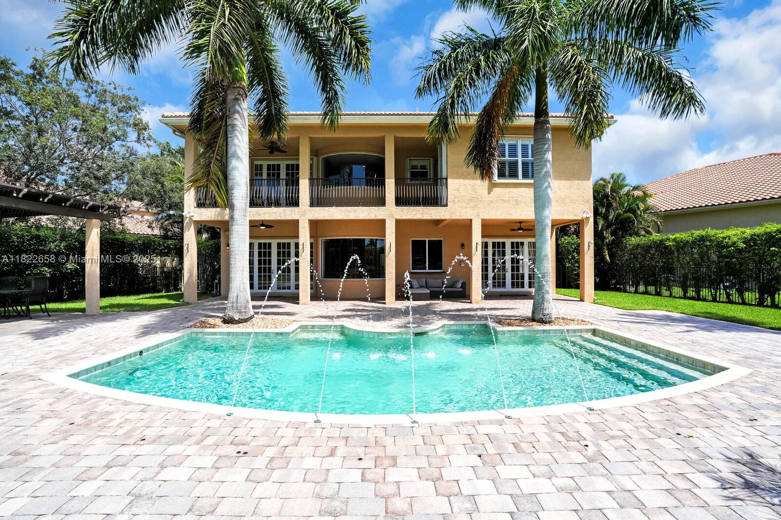 Stunning 6BR/4BA lakefront estate on oversized lot in sought-after Canyon Springs. Enjoy a private backyard oasis with pool, lush green space, and a Blaze outdoor kitchen under a 16x18 pergola. Interior features include crown & Westcott molding, coffered ceilings, plantation shutters, hardwood & tile floors, marble vanities, custom built-ins, media room w/100" screen & projector, wine room w/fridge, plus new ACs & water heater. Gated community with resort-style amenities—clubhouse, gym, tennis, and more. The perfect blend of comfort, style, and functionality.
A must-see!