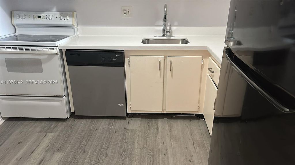 Photo of 8000 Fairview Dr #306, Tamarac, FL 33321 (MLS # A11978142)