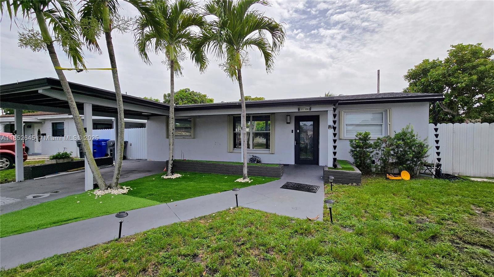 Updated and upgraded single-family home featuring 3 bedrooms and 1 remodeled bath. Enjoy a brand-new chef’s kitchen with stainless steel appliances and spacious quartz countertops. New Front Load Washer and Dryer. Oversized porcelain flooring adds modern elegance throughout. 70" 4K mounted TV is included! Accordian Shutters, Covered parking plus additional spaces. Located in a quiet neighborhood near top-rated schools, fine dining, and major commuter routes for easy access to all points of interest. Quick and easy approval process—don't miss out, this one won’t last!