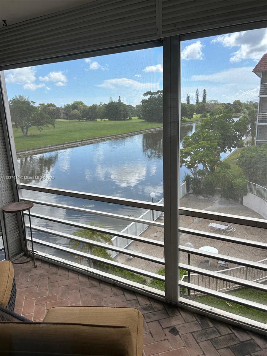 Nestled in the lush, gated Las?Vistas community, this corner unit is completely remodeled 2-bedroom, 2-bathroom retreat that offers style, comfort and peace of mind. Has a bright, open-concept modern kitchen. Both bedrooms are generously sized the primary suite boasts a large walk-in closet and a spa-like en suite bathroom with frameless glass shower and dual vanity, while the second bedroom sits steps from a full second bathroom finished with contemporary fixtures and stylish tile. Enjoy year-round comfort with central AC, and revel in the updated finishes Outside your front door, Las?Vistas offers a sparkling pool, clubhouse, and fitness center. Located minutes from dining, shopping & Inverrary’s recreational amenities, this turnkey gem perfectly blends modern elegance & community living