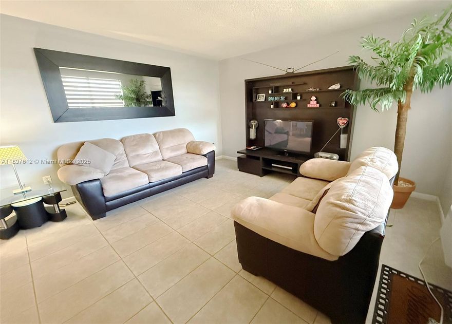 Beautifully updated 1BD/1BA condo on the 2nd floor at Mar-Len Gardens in North Miami Beach! This bright and spacious unit features a remodeled kitchen with wood cabinets and granite counters, updated bathroom, and central A/C throughout the unit—plus a wall A/C for added comfort when cooling just one room. Sold fully furnished, just bring your toothbrush and move right in! Enjoy a screened balcony overlooking garden and pool, perfect for morning coffee. Active 55+ gated community offering two pools, clubhouse, gym, library and billiard room. Great location near shopping, dining, beaches, and public transportation. Come make this place yours and schedule your visit. Easy to show, vacant.