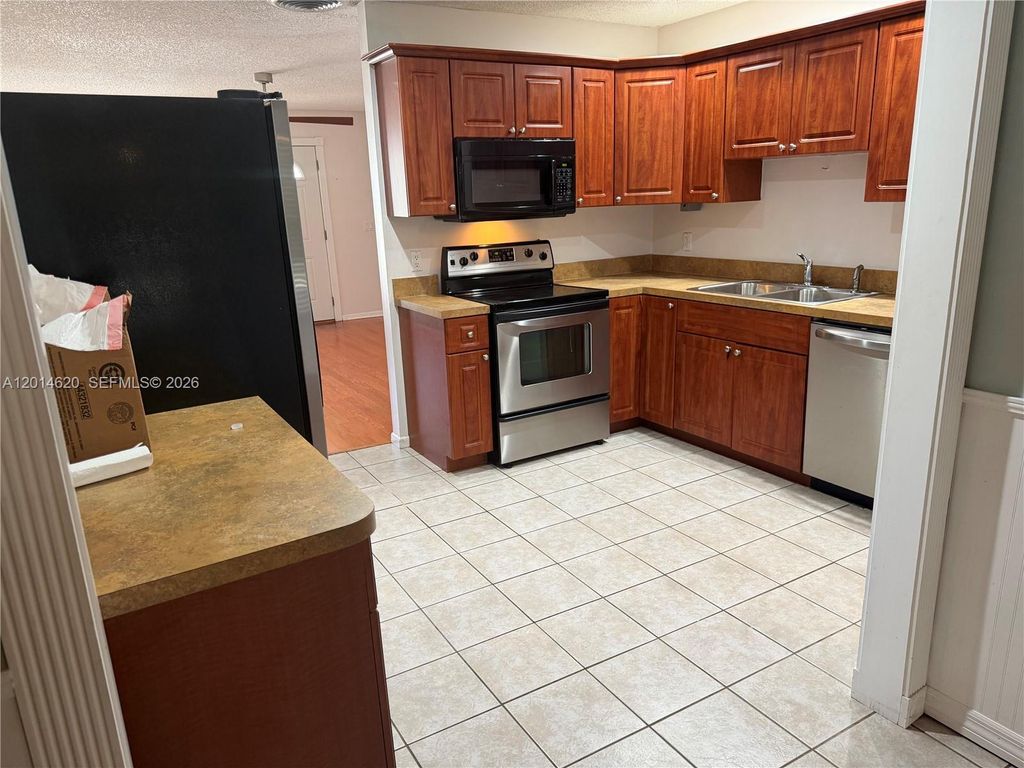 Photo of 2240 NE Rustic Way, Jensen Beach, FL 34957 (MLS # A12014620)