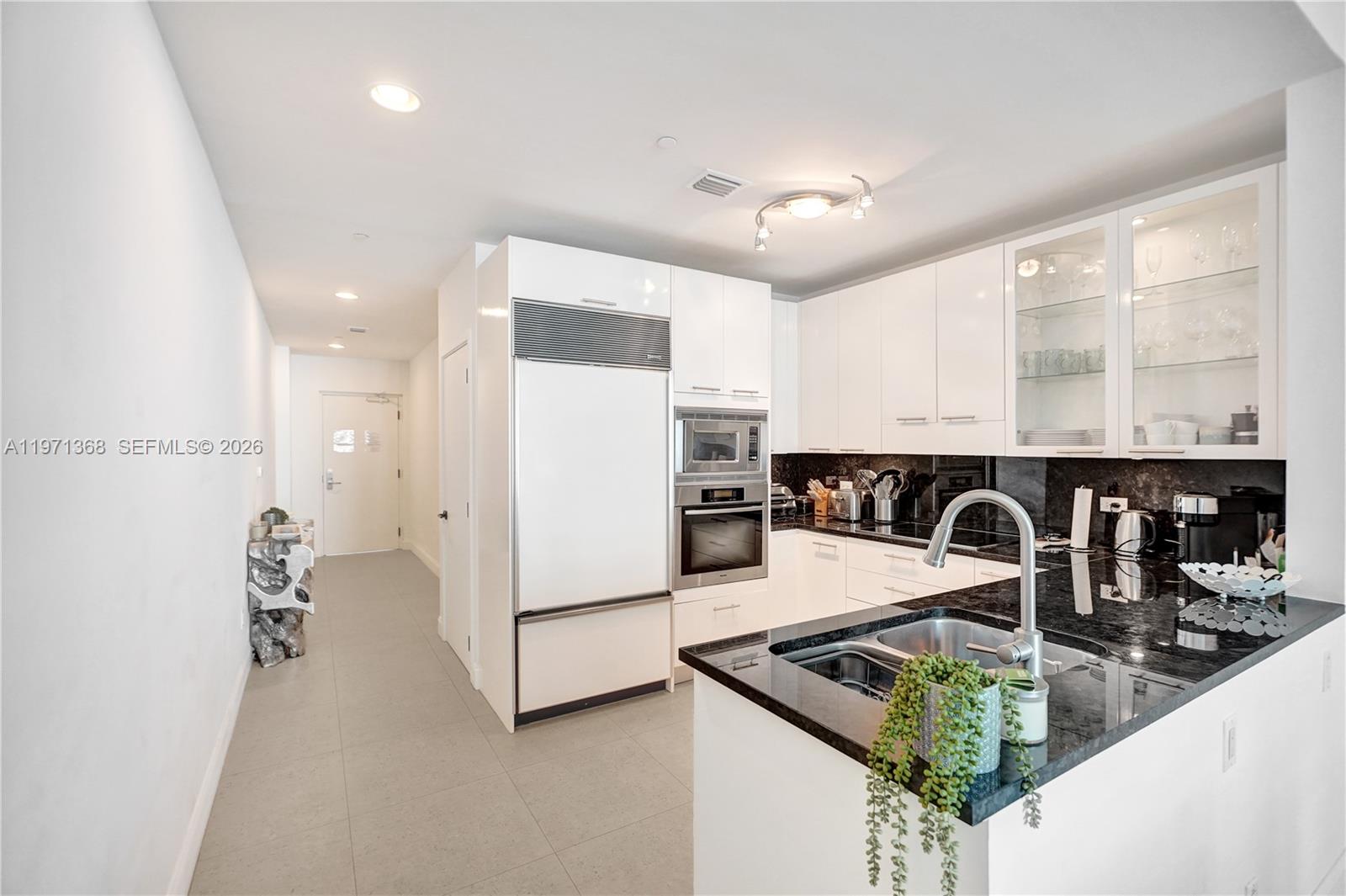 SOUTH CARILLON BEACH COND - Residential