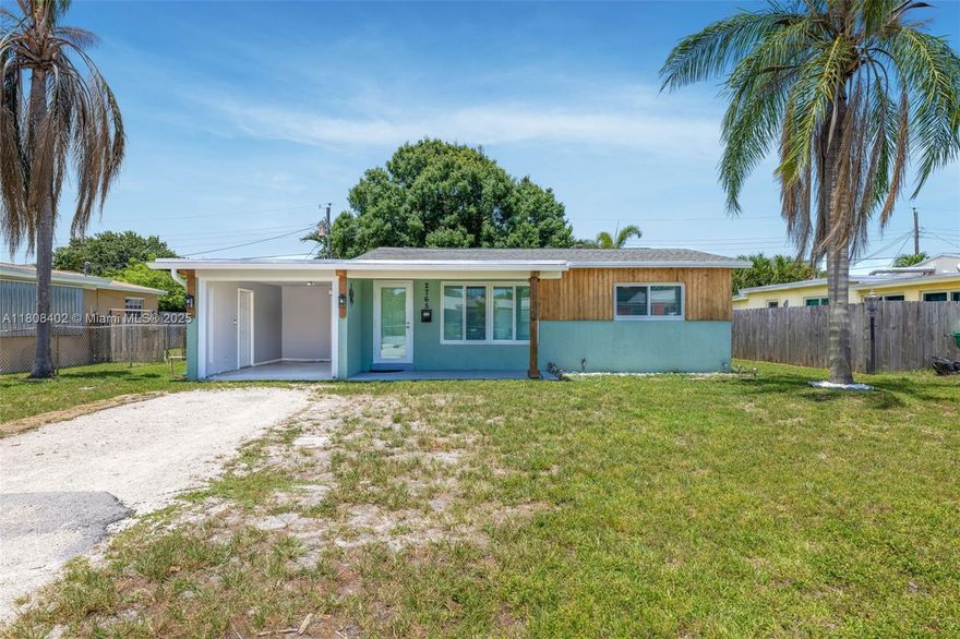 This 3-bedroom, 2-bathroom home blends comfort, convenience, and potential. With hurricane-impact windows and doors, plus a roof and A/C under 7 years old, it's move-in ready and offers peace of mind.

Centrally located between the iconic Hard Rock cafe and South Florida’s beaches—and just minutes from the airport—you’ll enjoy easy access to everything.

The kitchen and bathrooms have been tastefully updated, and there’s still room to customize and add value. The spacious backyard is perfect for entertaining, with space to add a pool. The open, garage-style carport offers storage and can easily be enclosed to expand living space.

Don't miss this opportunity in a prime location!