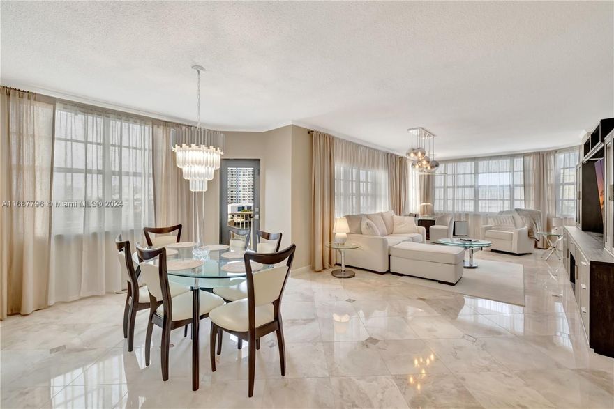 The most spectacular 2/2 unit in Hemisphere on the market NOW! Corner unit! Style reimagined! Entirely remodeled! Just steps to the beach! Breathtaking, full front Intracoastal water views! A sleek, modern design with luxurious finishes. Exquisite marble floors flow seamlessly throughout! Brand new appliances. Striking onyx backsplashes add a touch of elegance. The open layout invites to an abundance of natural light, a perfect blend of comfort and high-end living, offering an unparalleled waterfront lifestyle. Perfect for investors or residents! Located in a highly sought-after area, just minutes away from top-tier shopping, dining, and entertainment. Assigned parking spot, storage. Stellar amenities! Maintenance includes also A/C and WIFI! MUST SEE!
