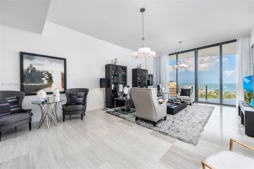 Magnificent bayfront condo in Coconut Grove - featuring a private elevator with foyer entrance, 3 bedrooms, 2.5 baths, marble flooring through-out, 12ft floor-to-ceiling windows overlooking Biscayne Bay, custom closets, Subzero & Wolf appliances, and an expansive terrace. Resort-like amenities include 24-hr concierge and valet, fitness center including private training rooms, spa and sauna, pools with cabanas, BBQ area, kids rooms, theater, and more.