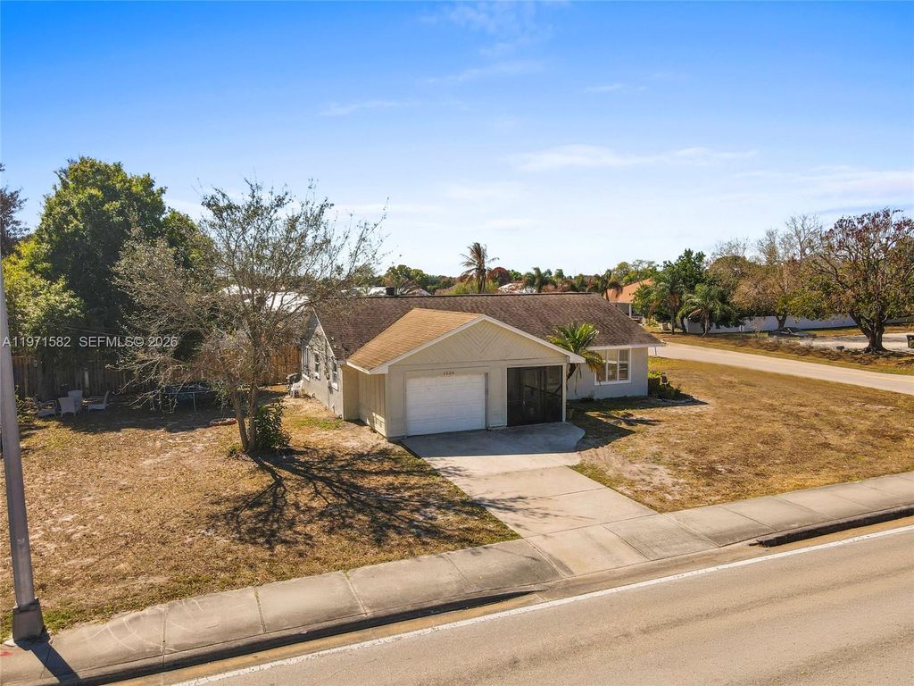 Photo of 1526 SE Port St Lucie Blvd, Port St Lucie, FL 34952 (MLS # A11971582)