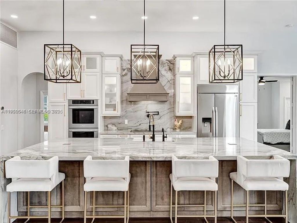 Photo of 2496 Eagle Run Dr, Weston, FL 33327 (MLS # A11950546)