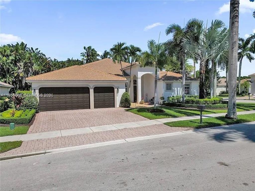 Photo of 2496 Eagle Run Dr, Weston, FL 33327 (MLS # A11950546)