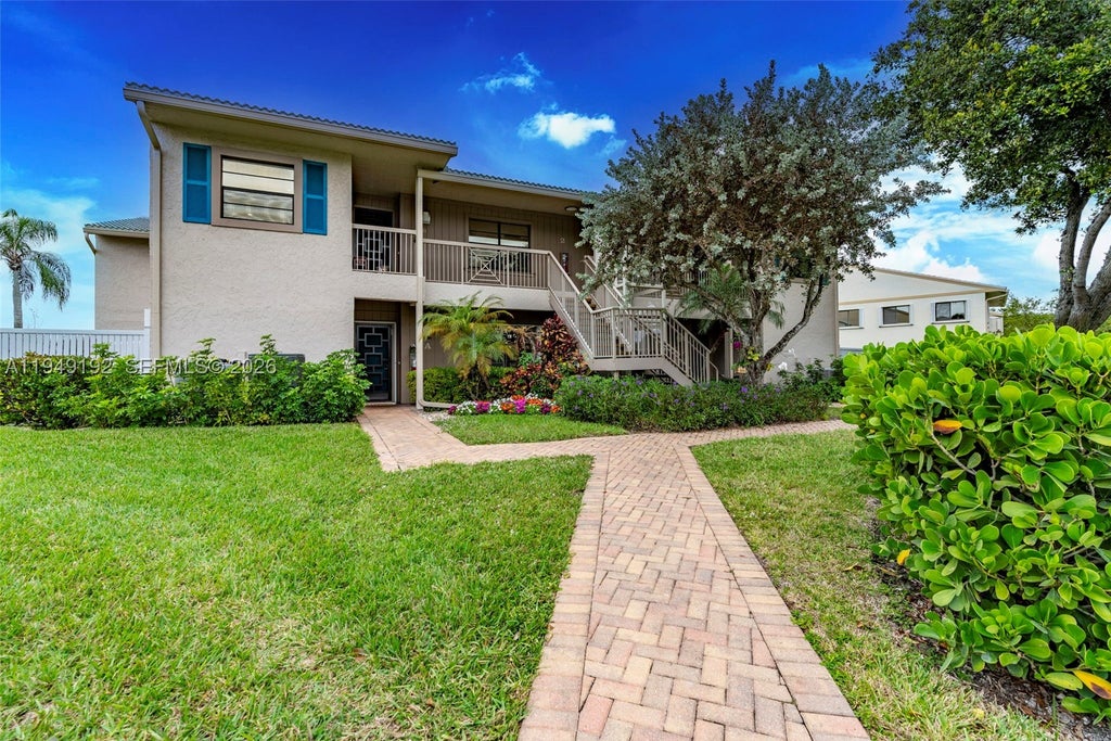Photo of 2 Eastgate Dr #C, Boynton Beach, FL 33436 (MLS # A11949192)