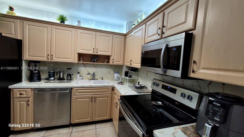 Photo of 4001 Hillcrest Dr #705, Hollywood, FL 33021 (MLS # A11966401)