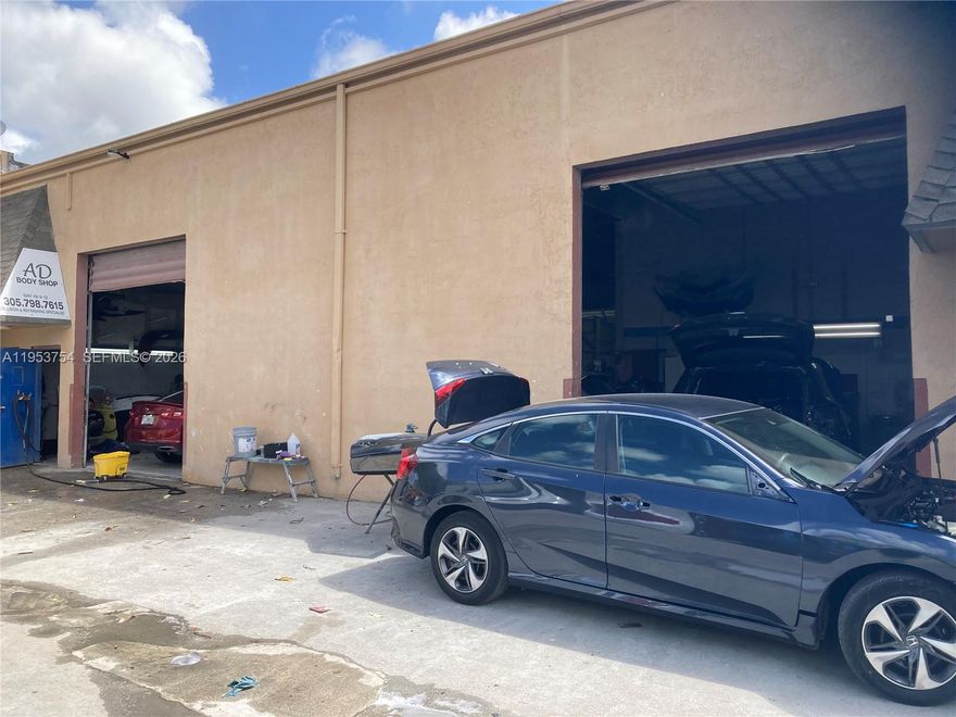 Exceptional opportunity in this purchase of 4 warehouses with Body Shop business included as the owner is retiring and may consider seller financing. There are two options to buy; 4 warehouse units #2,8,9 & 12, which  contains Top-of-the-Line USA Garmat Paint Booth, four compressors, and all essential equipment to run the business for $1.8M.  Or purchase 3 warehouse units together #8, 9, & 12 which contains all the same equipment included for $1.5M, (see MLS listing #A11922979).  The building just passed the 40 year inspection with no problems, and was recently painted. Association dues are just $120 a month and each unit has 5 designated parking spaces totaling 20 spaces.  Building has security gate that closes every night and the Paint and Mechanical Licenses are transferable. Easy access to both 874 and Fl. Turnpike,  just a few blocks away.