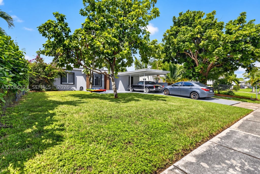 Photo of 5317 NE 5th Ave, Oakland Park, FL 33334 (MLS # A12086323)