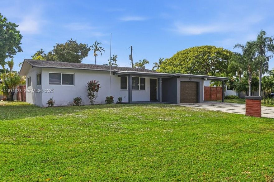 MODERN FINISHES, SUN-FILLED LIVING AND FLEXIBLE SOUTH FLORIDA LIFESTYLE. This Move-In Ready Corner-Lot Home Features Open Living Spaces With Abundant Natural Light And Polished Porcelain Tile Throughout. The Spacious Primary Suite Is A True Retreat With Its Own Climate Zone, Walk-In Closet, And A Spa-Inspired Bathroom Featuring A Wet Room, Multifunction Shower, And Hydrotherapy Microsilk Tub. Zoned Climate Control Ensures Comfort Throughout The Home. Dual Driveways Offer Exceptional Parking Flexibility With Room For Multiple Vehicles, A Boat, Or An RV - A Rare And Highly Desirable Feature. The Renovated Kitchen Showcases Quartz Countertops, Custom Cabinetry, And Premium Appliances, Designed For Both Everyday Living And Easy Entertaining. Enjoy Outdoor Living Under The Pergola-Covered Patio And A Generous Backyard Ready For Personalization. Additional Features Include Impact Windows & Doors, A 2019 Flat Roof, Updated Systems, And A Tankless Water Heater. Ideally Located Near Wilton Drive, Beaches, Dining, And Entertainment.