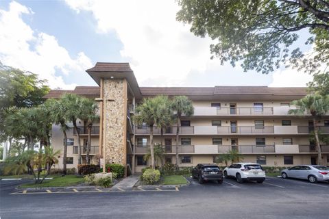Photo of 4965 E Sabal Palm Blvd #303, Tamarac, FL 33319 (MLS # A11855556)