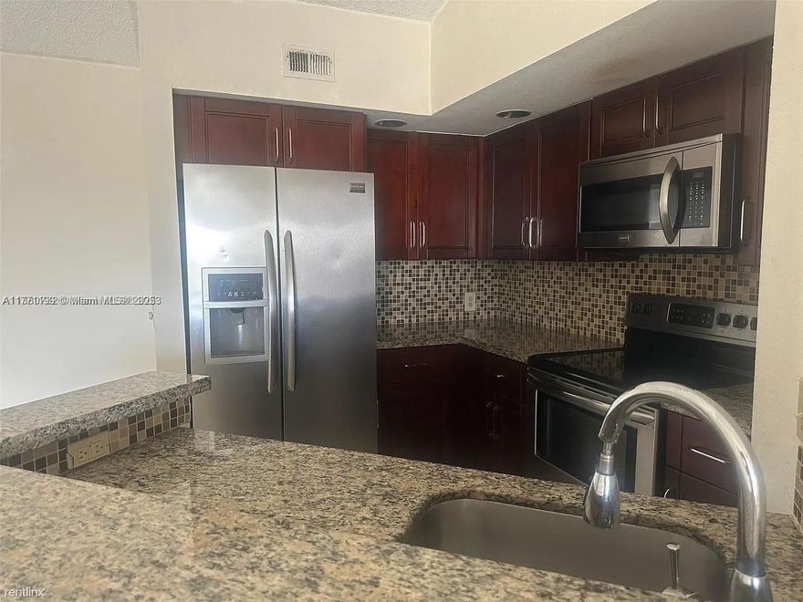This amazing 2/1 unit offers an exceptional location in West Palm Beach. All Upgraded Condo with a lake view! This condo offers lots of natural light, granite countertop, ceramic tile and washer and dryer inside the unit. This property is just minutes from the palm beach outlets and excitement of downtown. The area is well-connected with easy access to major highways. This gated community offers clubhouse, fitness center, pool and more.