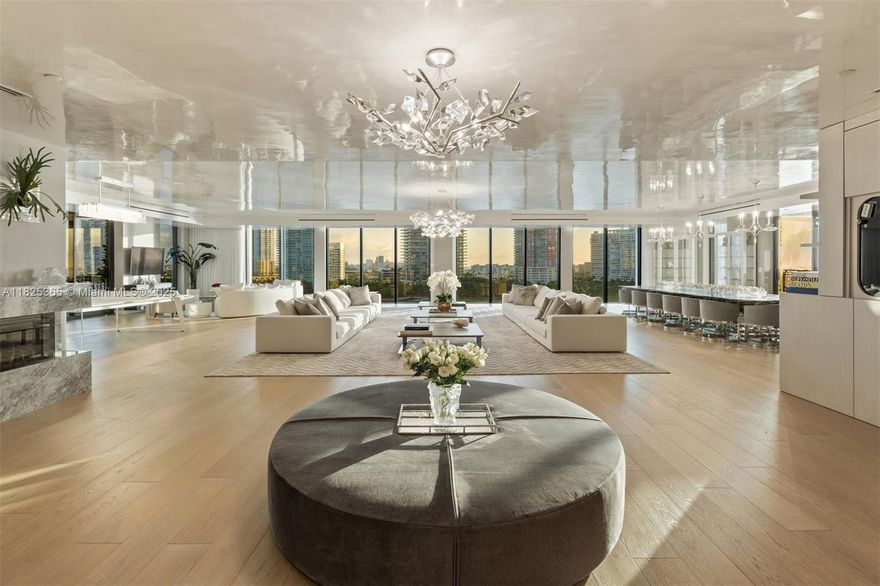 Experience this legacy 14,380 Total SF LPH at Palazzo Della Luna on Fisher Island. Offering 7 bds,+ staff suite , 8 fbs, and 2 powder. Feel the expansive spaces with breathtaking views of the ocean, bay, and city skyline, seamlessly connecting to multiple terraces. Inside, discover gallery walls, oak floors, and a Boffi kitchen equipped with Miele and Sub-Zero. The primary suite features a fireplace, marble bath, lounge area, and dual walk-ins. Unwind and entertain on the expansive 2,500+ square foot coveted private rooftop with a pool, outdoor kitchen, and living area all framed by panoramic vistas. Residents enjoy exclusive resort amenities spread over 216 acres, including a golf course, a marina, and much more. This is luxury living at its finest. A legacy home to enjoy, an investment to appreciate.