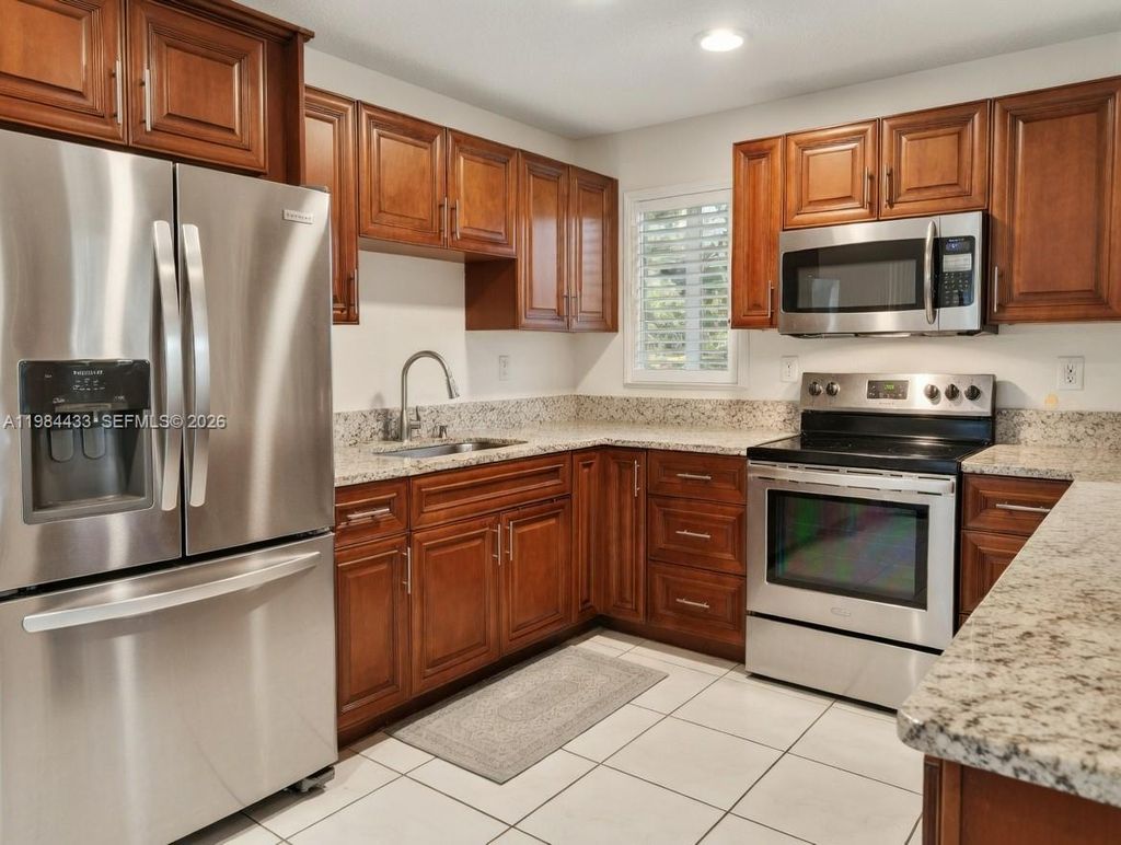 Photo of 8900 Washington Blvd #415, Pembroke Pines, FL 33025 (MLS # A11984433)