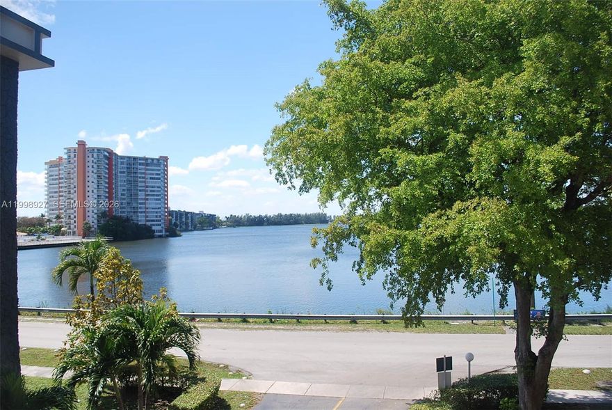 Spacious and well-kept 2BR/2BA corner unit located in the desirable Eighth Moorings Condominium, a peaceful 55+ community known for its calm and comfortable environment.

One of the larger corner units in the building, this bright condominium features an excellent layout with abundant natural light throughout. The interior is in nice original condition, offering a great opportunity for a buyer to update and customize to their taste.

The primary suite includes a large bathroom area and two closets, including a walk-in with ample room for wardrobe. Enjoy a private wraparound balcony—unique to corner units—perfect for relaxing while taking in tranquil lake views. Also, one of the few units in the building with a dedicated exterior storage space!

Ideally located just steps from Skylake Mall, with easy access to supermarkets, dining, and everyday services. The community features a scenic lakeside walkway and two swimming pools, including one heated for year-round enjoyment.

Low association fees include cable TV and water. Recent community updates include a newer roof and fresh exterior painting.

Conveniently located minutes from Aventura Mall, Sunny Isles Beach, major highways, hospitals, and places of worship.

A great opportunity in a prime location with plenty of potential and motivated seller—don’t miss it!