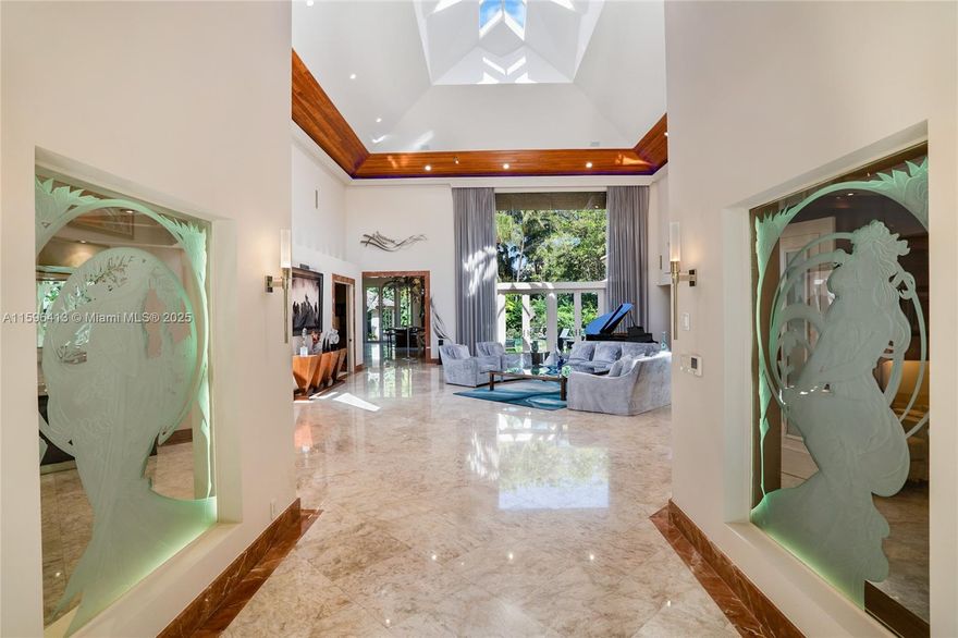 PRICE ADJUSTMENT FOR SALE Boca Grove’s most prestigious estate is located on a corner lot in the Rosedown Ct. cul-de-sac. Surrounded by tropical fruit trees and no adjacent neighbors, you will enjoy the raised ceilings, open space with abundant natural light, an elegant dining room, a media room, a magnificent salon with a fireplace & a custom wet bar, office, three bedrooms, exercise room with a sauna and a floor to ceiling onyx master bath designed to be luxurious and opulent. The home also offers a saltwater pool with a waterfall and grotto, perfect for relaxing and cooling off in the shade. Lastly, the house has a 360-degree glass detached office and a home generator. Boca Grove is a boutique-style community that offers a members-only golf, tennis, and country club. AERIAL & 360 TOUR