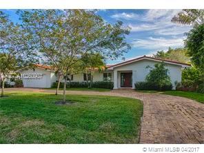 Beautiful 1 story house completely remodeled on a quiet street on Coral Gables. The house consists of 4 Bedrooms plus 1 office that can serve also as maids quarters. 2 full baths plus 1 half bath, laundry room and 2 covered car garage with plenty of space for additional space on circular driveway. Front and back garden with kids playground oversize pool. House also features impact glass windows, 2 separate AC units, walk in closet in the master bedroom. Stainless steel appliances, granite countertop and a BBQ Grill in the back yard.
