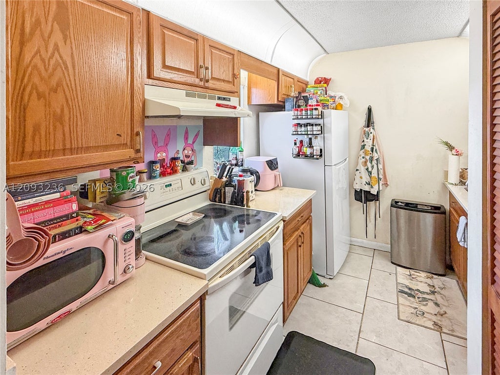 Photo of 9926 Twin Lakes Dr #7-D, Coral Springs, FL 33071 (MLS # A12093236)