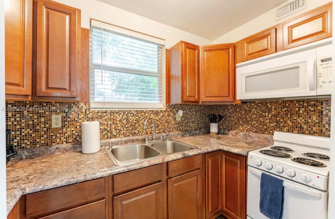 Fully furnished Studio apartment with private entrance and dedicated parking space. Full size kitchen and walk in closet. Rent includes water, electricity, and internet.