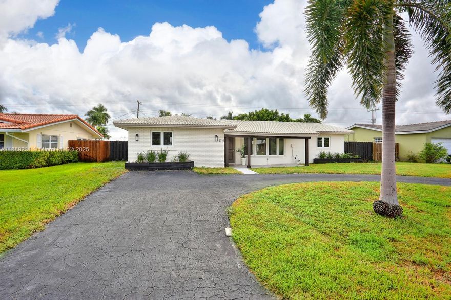 Beautifully renovated home in sought-after Coral Ridge, just minutes from Fort Lauderdale’s world-famous beaches, dining, shopping, and entertainment. This light-filled residence features new impact windows, updated plumbing, modern flooring, washer & dryer, and a fully refinished pool. The open-concept designer kitchen boasts quartz countertops, sleek cabinetry, stainless steel appliances, and an island with bar seating. Spacious living areas offer a neutral palette and modern finishes throughout. The private backyard is perfect for year-round outdoor living, with plenty of space to relax or entertain by the pool. No HOA and rapid approval make for an easy move-in. Convenient location close to I-95, with quick access to Downtown Fort Lauderdale, Las Olas, and the airport.