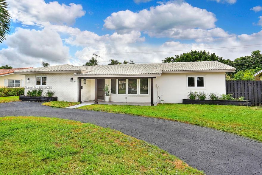Beautifully renovated home in sought-after Coral Ridge, just minutes from Fort Lauderdale’s world-famous beaches, dining, shopping, and entertainment. This light-filled residence features new impact windows, updated plumbing, modern flooring, washer & dryer, and a fully refinished pool. The open-concept designer kitchen boasts quartz countertops, sleek cabinetry, stainless steel appliances, and an island with bar seating. Spacious living areas offer a neutral palette and modern finishes throughout. The private backyard is perfect for year-round outdoor living, with plenty of space to relax or entertain by the pool. No HOA and rapid approval make for an easy move-in. Convenient location close to I-95, with quick access to Downtown Fort Lauderdale, Las Olas, and the airport.