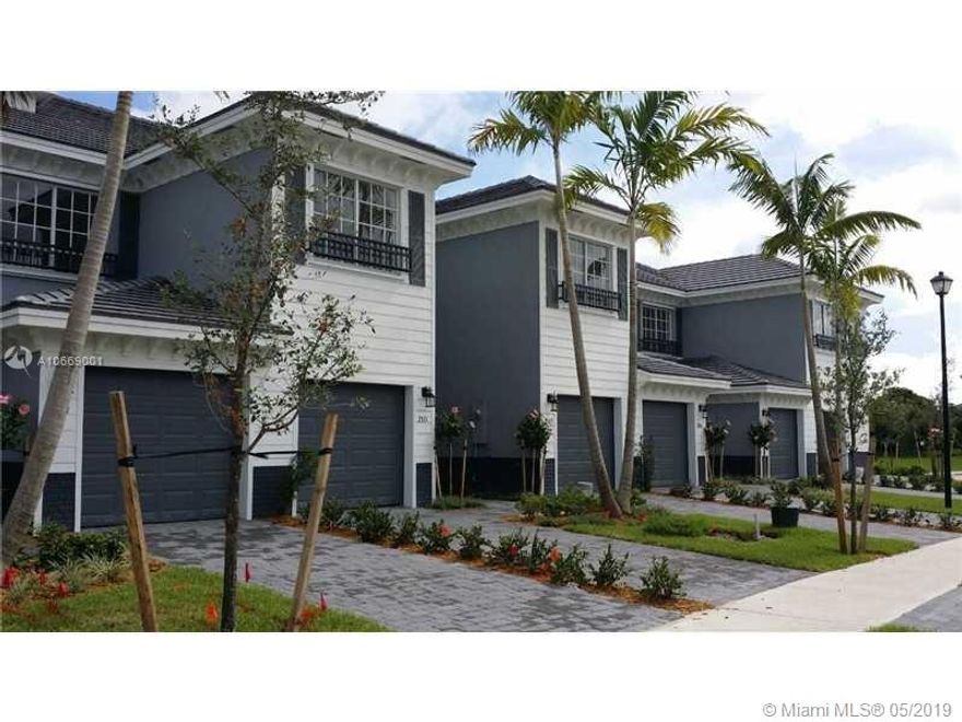 Beautiful 3/2 townhouse In Lauderhill @ Cassa Georgetown. This is a must see gated community conveniently located. Amenities include access to basketball court, swimming pool and children's outdoor play area.Sliding glass doors open to backyard and lake. Newly constructed, features: Italian designed cabinets, stainless steel appliances, porcelain marble flooring, washer/dryer and attached automatic garage. MINIMUM 600 CREDIT SCORE REQUIRED BY HOA. Water is not included.