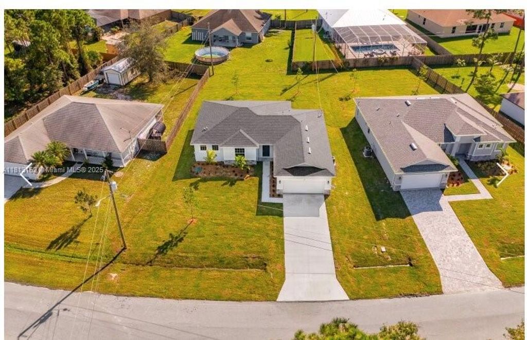 Photo of 872 SW Harvard Rd, Port St Lucie, FL 34953 (MLS # A11813162)