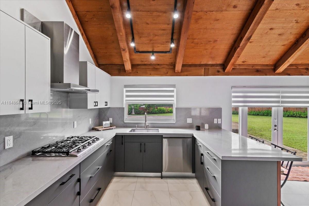 Stunning 3BR/2BA home in the heart of Miramar on nearly half an acre! Featuring a split layout, 2-car garage, and vaulted ceilings that elevate the spacious, sunlit living area. At the center of the home, a spiral staircase leads to a unique office/den—perfect for remote work or creative space. The chef’s kitchen is ready to impress, and the remodeled master suite boasts a sleek, modern-minimalist design. Gated side entrance fits RVs, boats, or jet skis. Quick access to major highways. Flexible lease terms: 1 year or less. A rare blend of space, style, and convenience—come see it today!