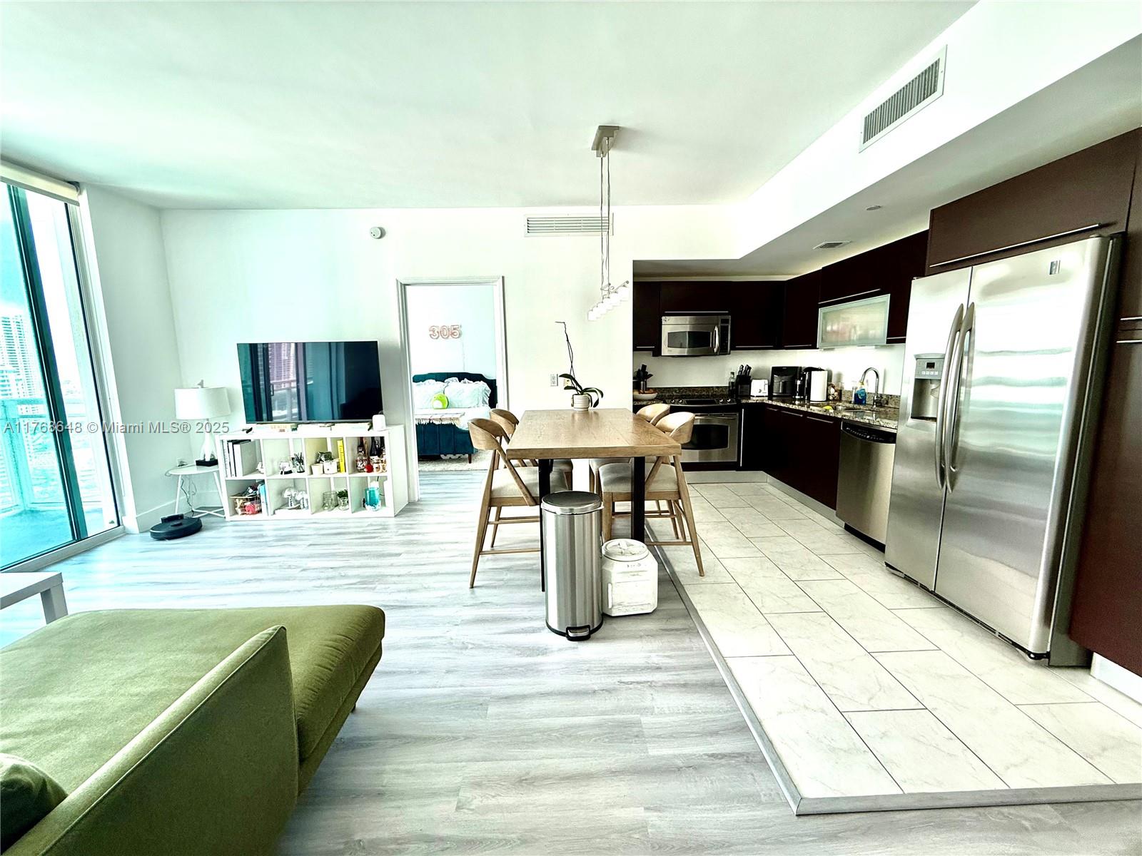 Welcome to The Plaza on Brickell. This elegant high-rise residence offers sophisticated urban living with stunning city views. This is a beautifully 2-bedroom . 2 bathroom unit with Biscayne Bay views. This unit has laminated wood floors throughout. This residence offers a lifestyle of ease and opulence. Experience the epitome of city living with assigned parking and a host of amenities, all within this coveted Miami address, 24hr security concierge, gym, 2 Infinity-edge heated pools, , 24hr business center, club room,Theater room and valet parking. Walk to Mary Brickell Village, Brickell City Center mall, restaurants and more.