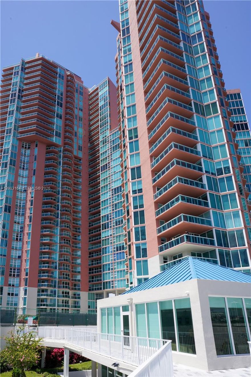 Located in the prestigious Hidden Bay Condo, this stunning luxury residence offers the perfect blend of elegance, comfort, and a prime location in the heart of Aventura. This spacious unit features 3 bedrooms plus a den, with breathtaking views of the bay and private marina. The residence is designed for both relaxation and entertaining, with abundant natural light and serene water views. The building offers resort-style amenities, including tennis courts, a beautifully renovated pool area, fully upgraded locker rooms with sauna, a state-of-the-art fitness center, a conference room, and two elegant party rooms. Ideally located close to world-class shopping, dining, and entertainment, this is luxury waterfront living at its finest.