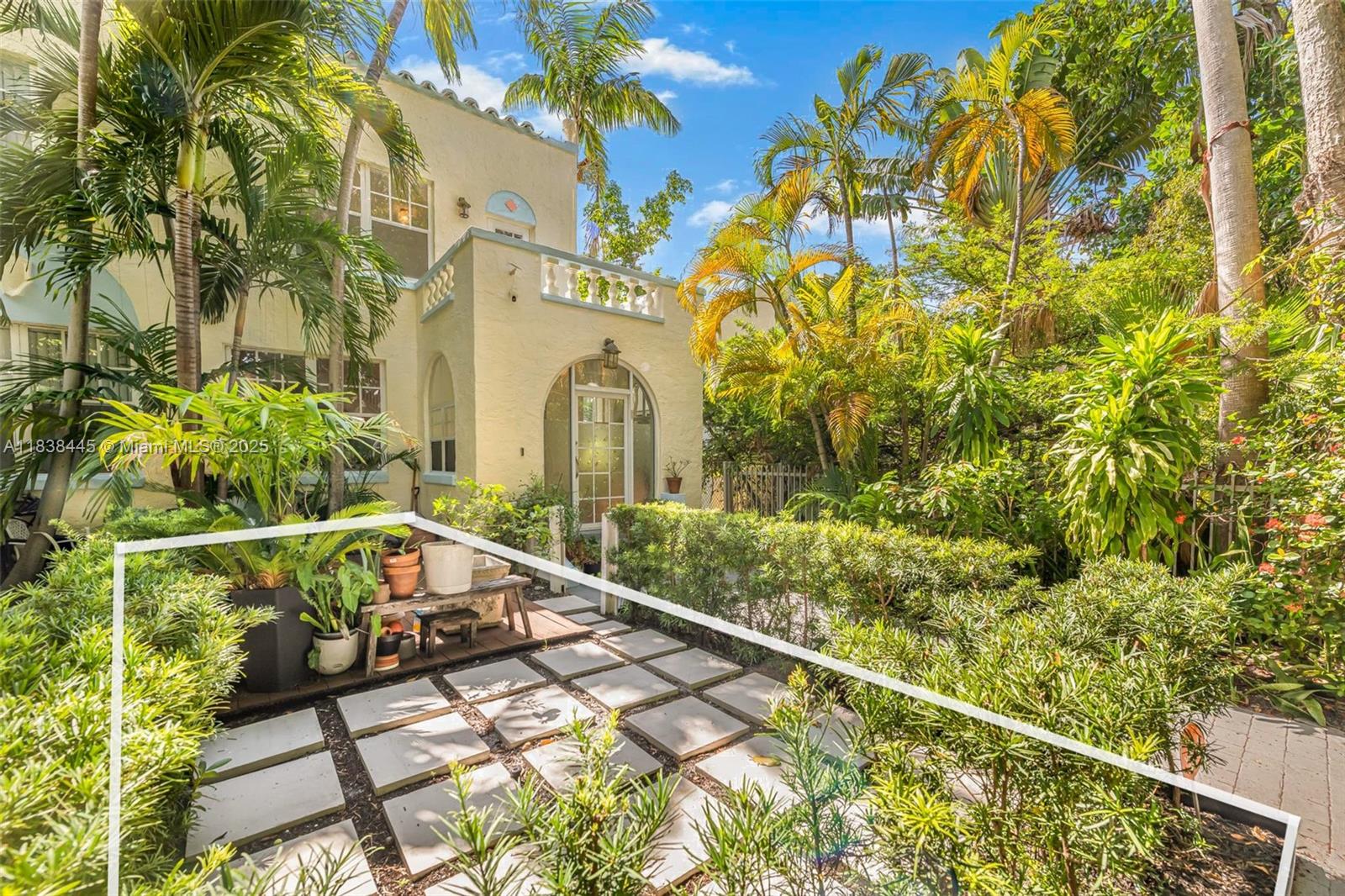 Exceptional opportunity to own a charming Mediterranean-style villa townhouse on tree-lined Meridian Avenue. This bright, south-facing corner home lives like a private residence and features 2 bedrooms, 1.5 bathrooms, and a large garage with additional storage. Enjoy the rare luxury of a private garden/outdoor space and a large balcony directly off the main bedroom — perfect for relaxing or entertaining.
The spacious split floor plan includes a dine-in kitchen, hardwood floors, stainless steel appliances, and a full-size washer and dryer. Just steps from Flamingo Park and minutes to the beach, this home echoes the timeless charm of classic Miami Beach.