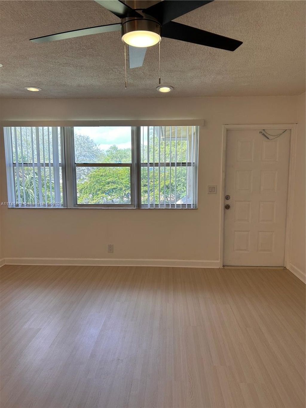 Photo of 1045 Twin Lakes Dr #27-E, Coral Springs, FL 33071 (MLS # A11749412)