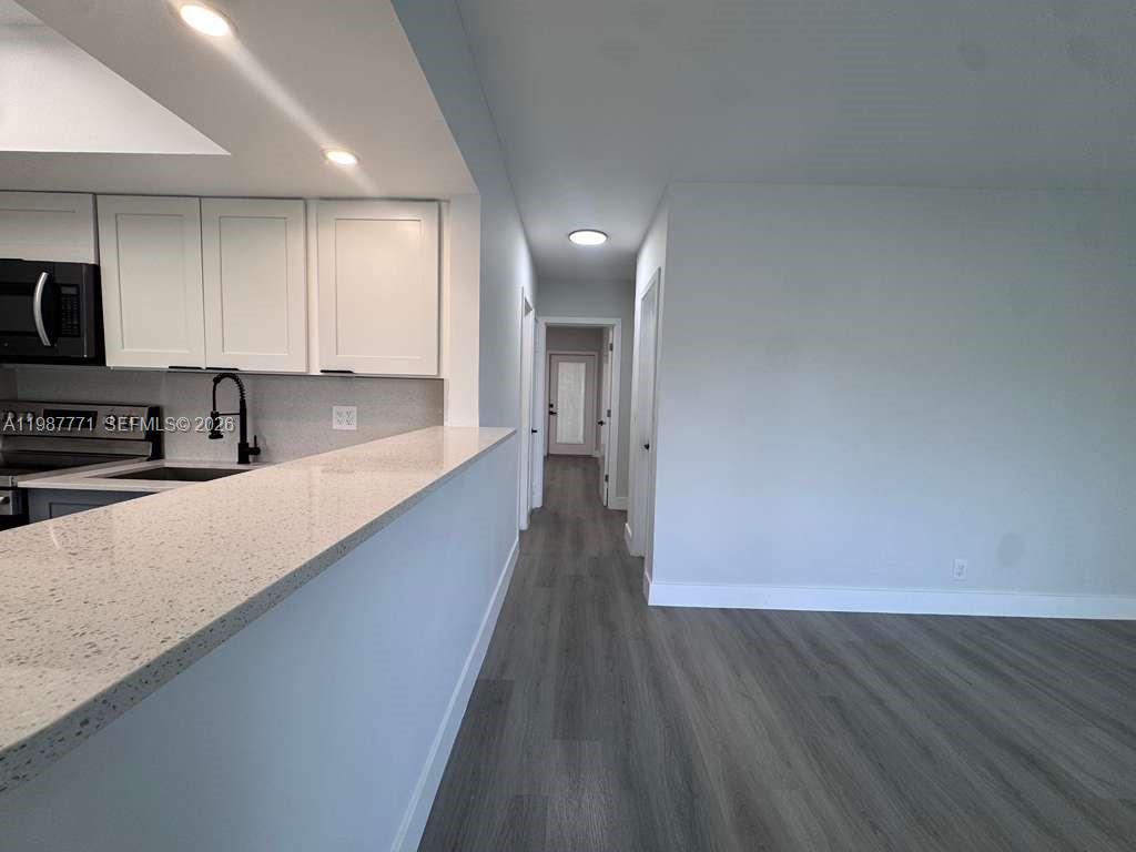 ENVOY APARTMENTS CONDOMIN - Residential Lease